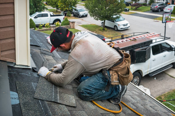 Professional Roof Replacement technician working in Newark, IL